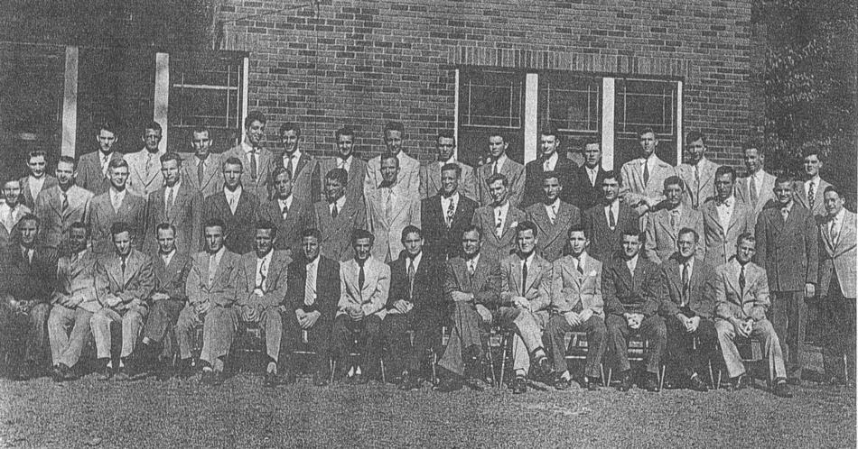 Group Photo in front of House